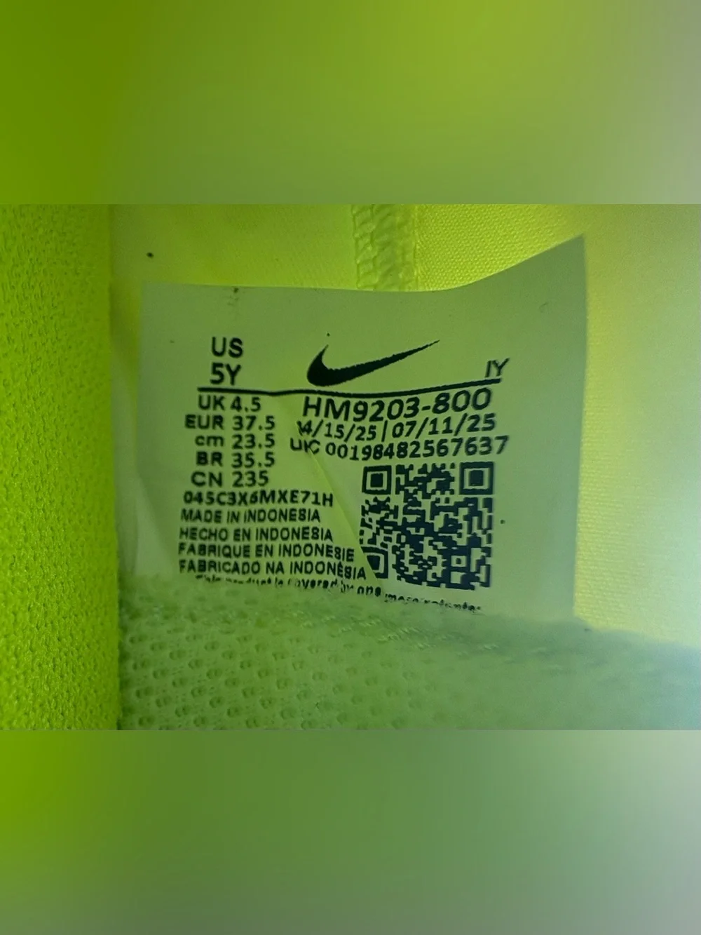 Nike Neon Yellow Soccer Cleats with Orange and Black Accents